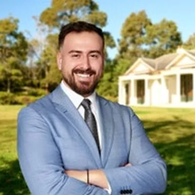 George Karasalidis, Ray White
